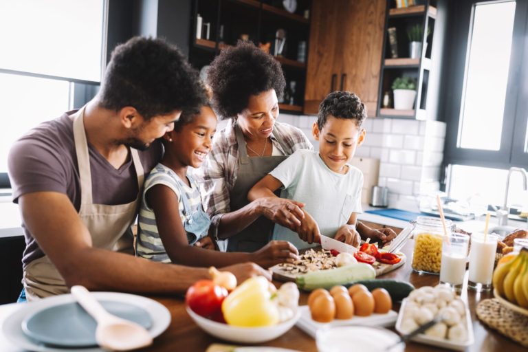 Family cooking nights are a great way to help with mealtime battles, family cooking together